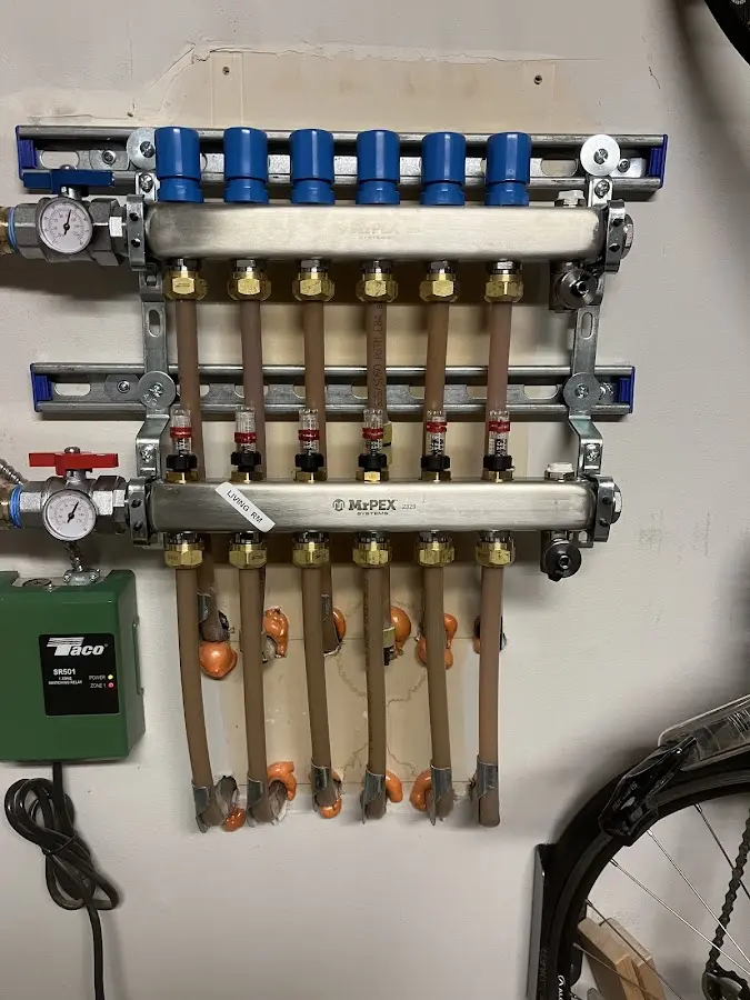 Plumber performing Water Heater Repair at a residential property in Tarentum